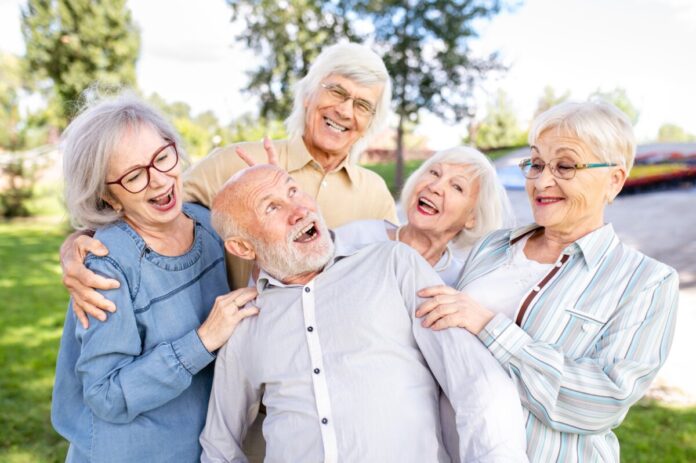 Group,Of,Happy,Elderly,People,Bonding,Outdoors,At,The,Park
